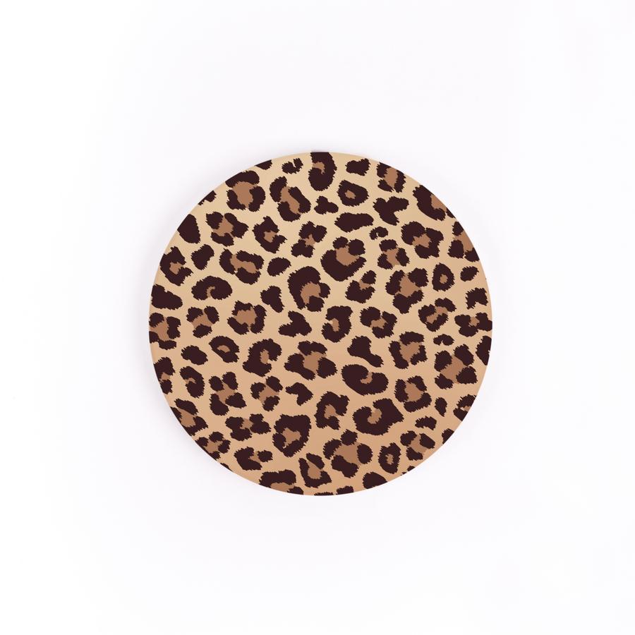 cheetah car coaster is cream with tan and brown cheetah pattern all over and displayed on a white background