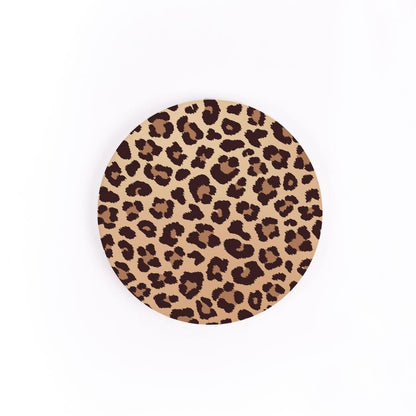 cheetah car coaster is cream with tan and brown cheetah pattern all over and displayed on a white background