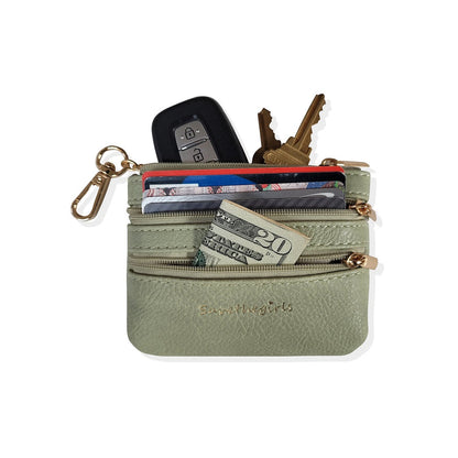 zipper pouch with cash, cards, and keys in it.