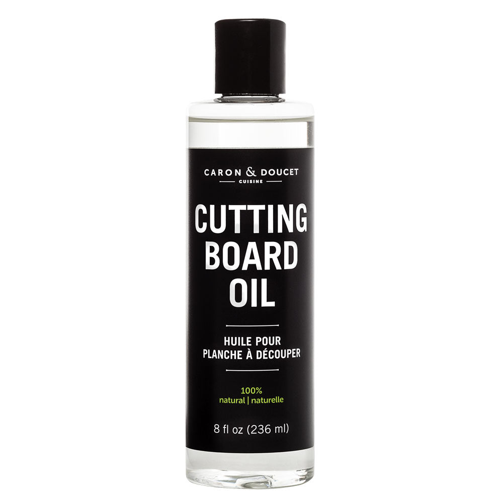 the cutting board conditioning oil on a white background