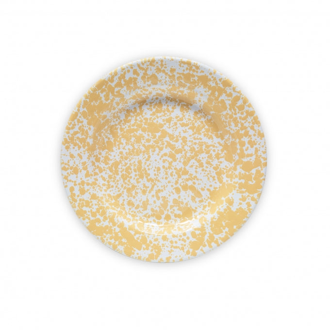 yellow dinner plate on a white background