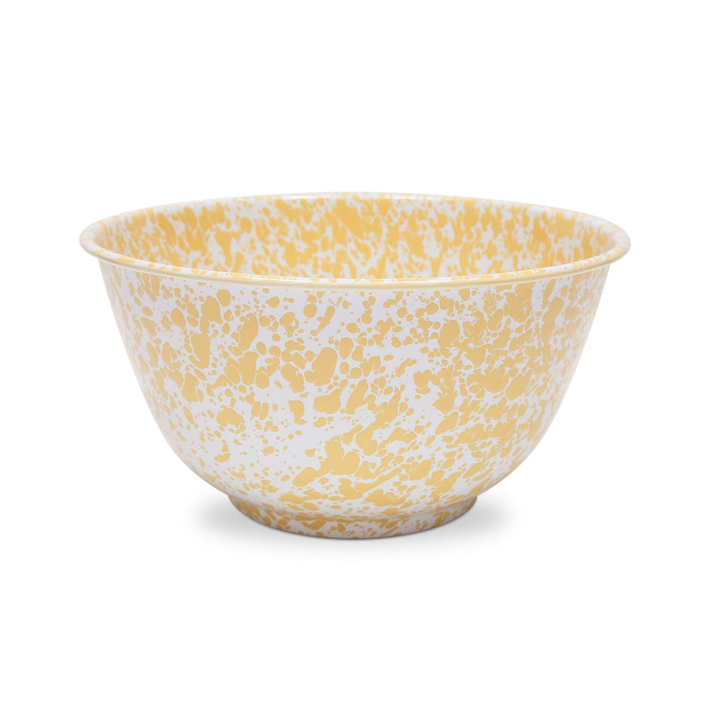 large yellow serving bowl on a white background