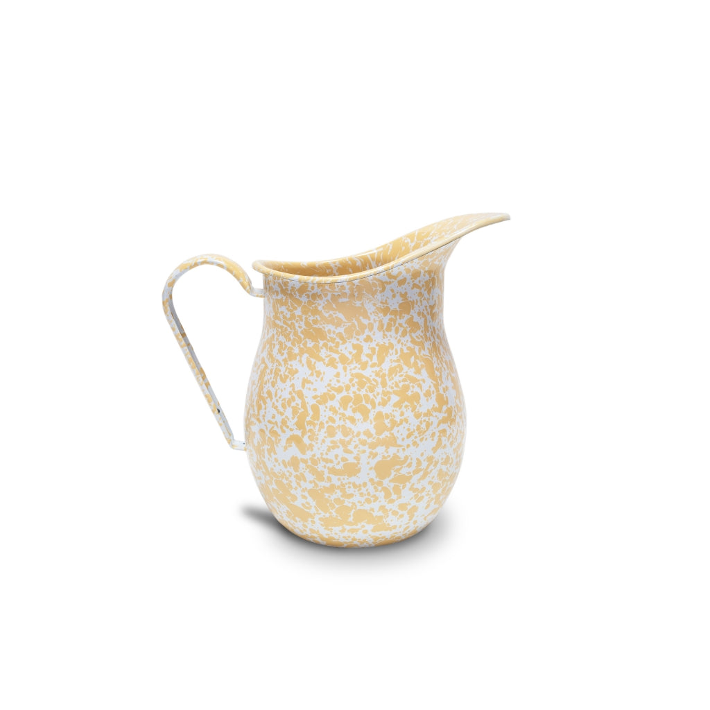 large yellow pitcher on a white background
