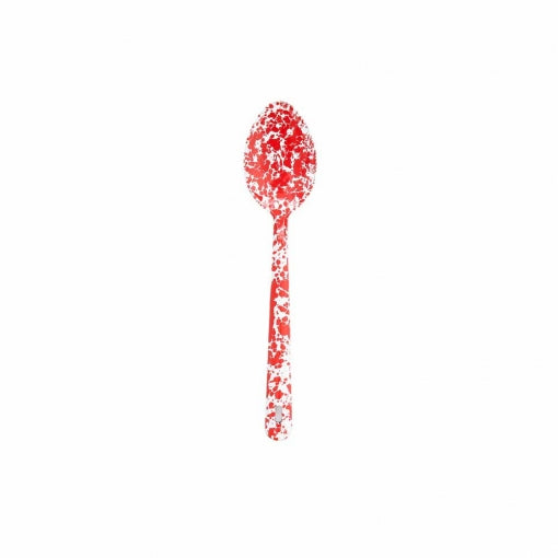 red serving spoon on a white background