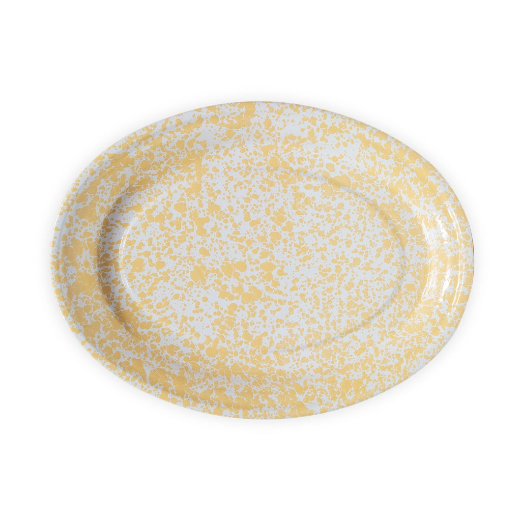 yellow oval platter on a white background