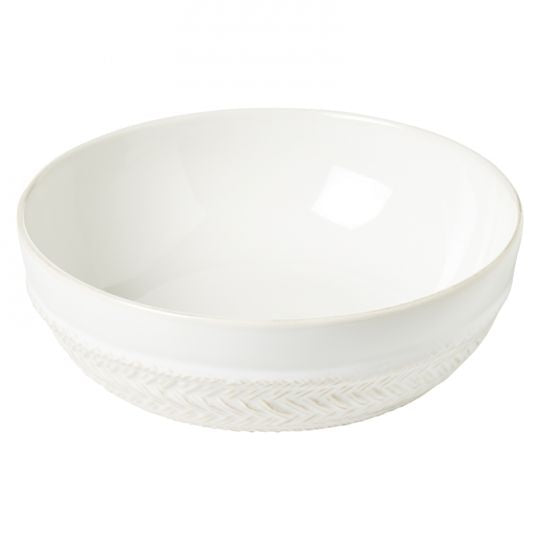 angled view of the le panier coupe pasta bowl on a white background