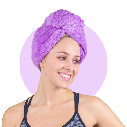 front view of a woman wearing the purple drystyle hair turban against a white background
