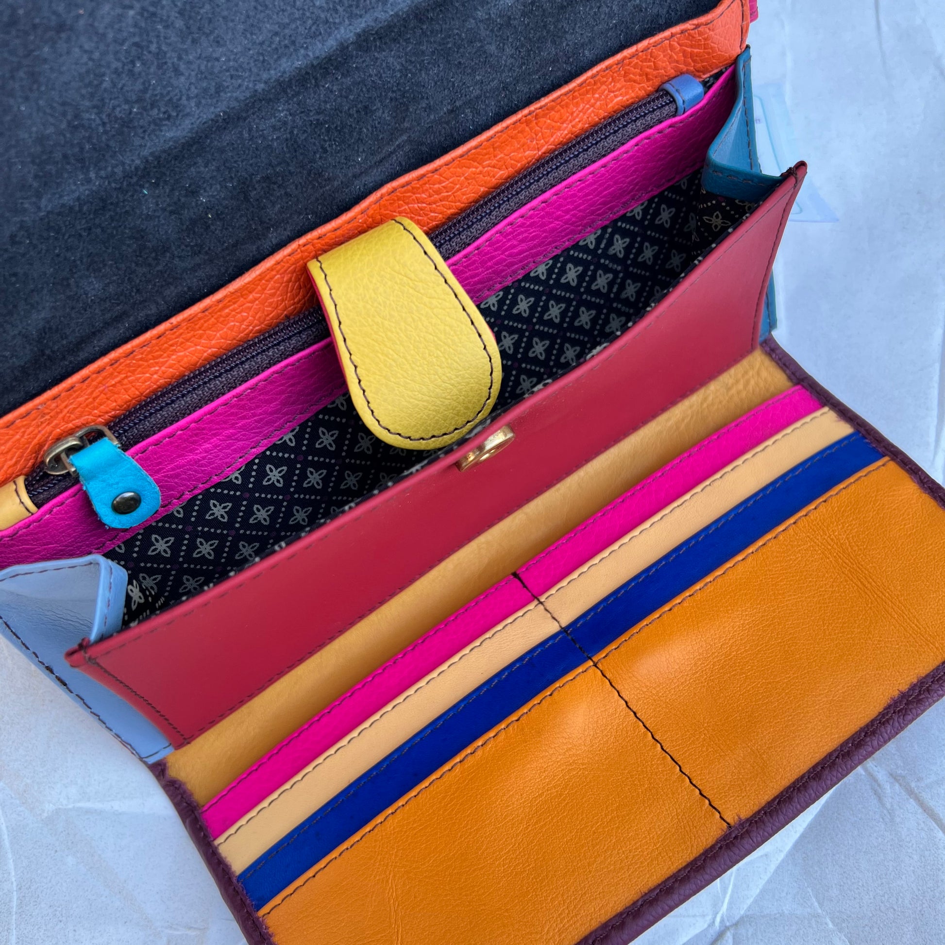 top inside view of the maroon and mango secret clutch