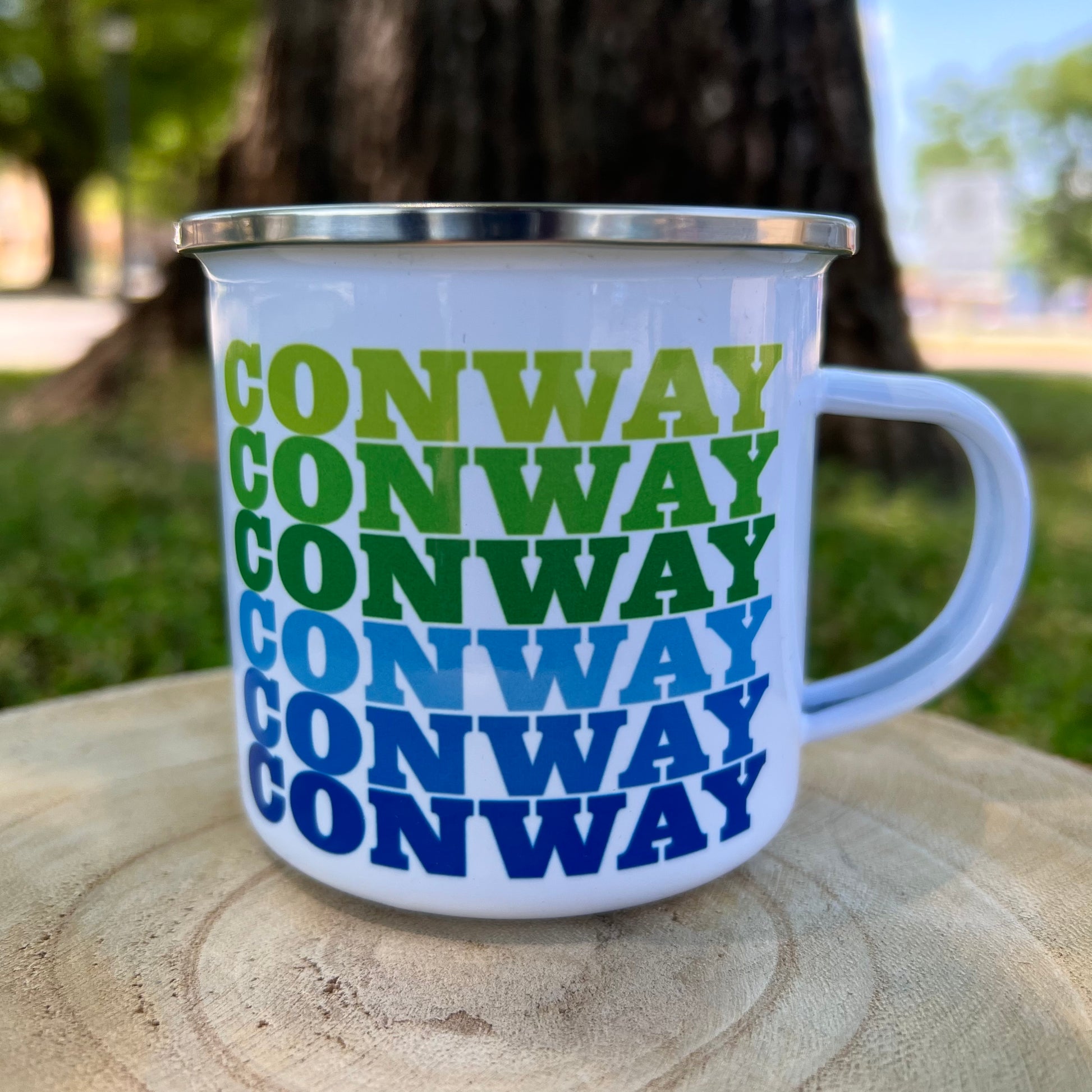 tin mug with "conway" written six times with green to blue ombre coloring.