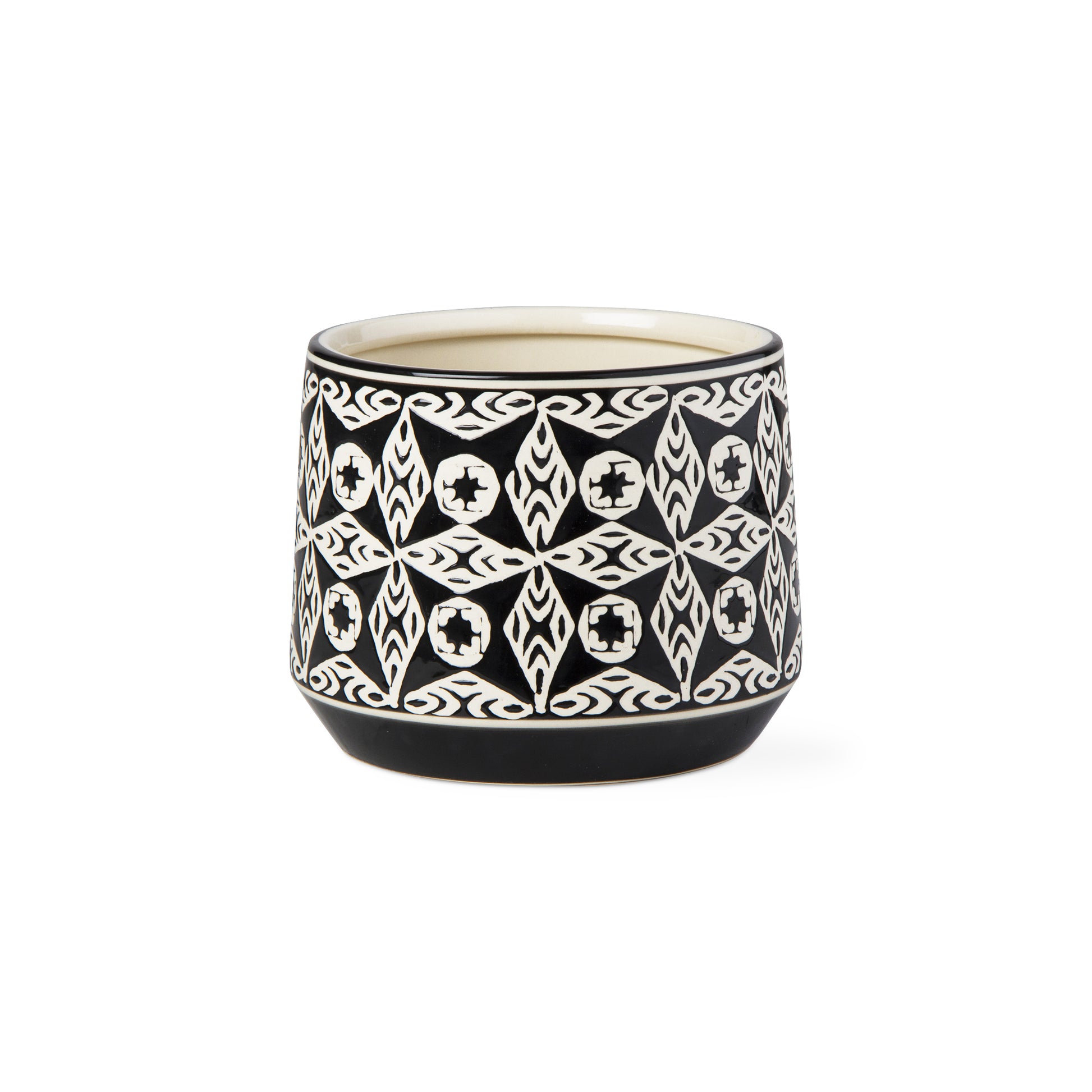 black and white planter with geometric design on white background.