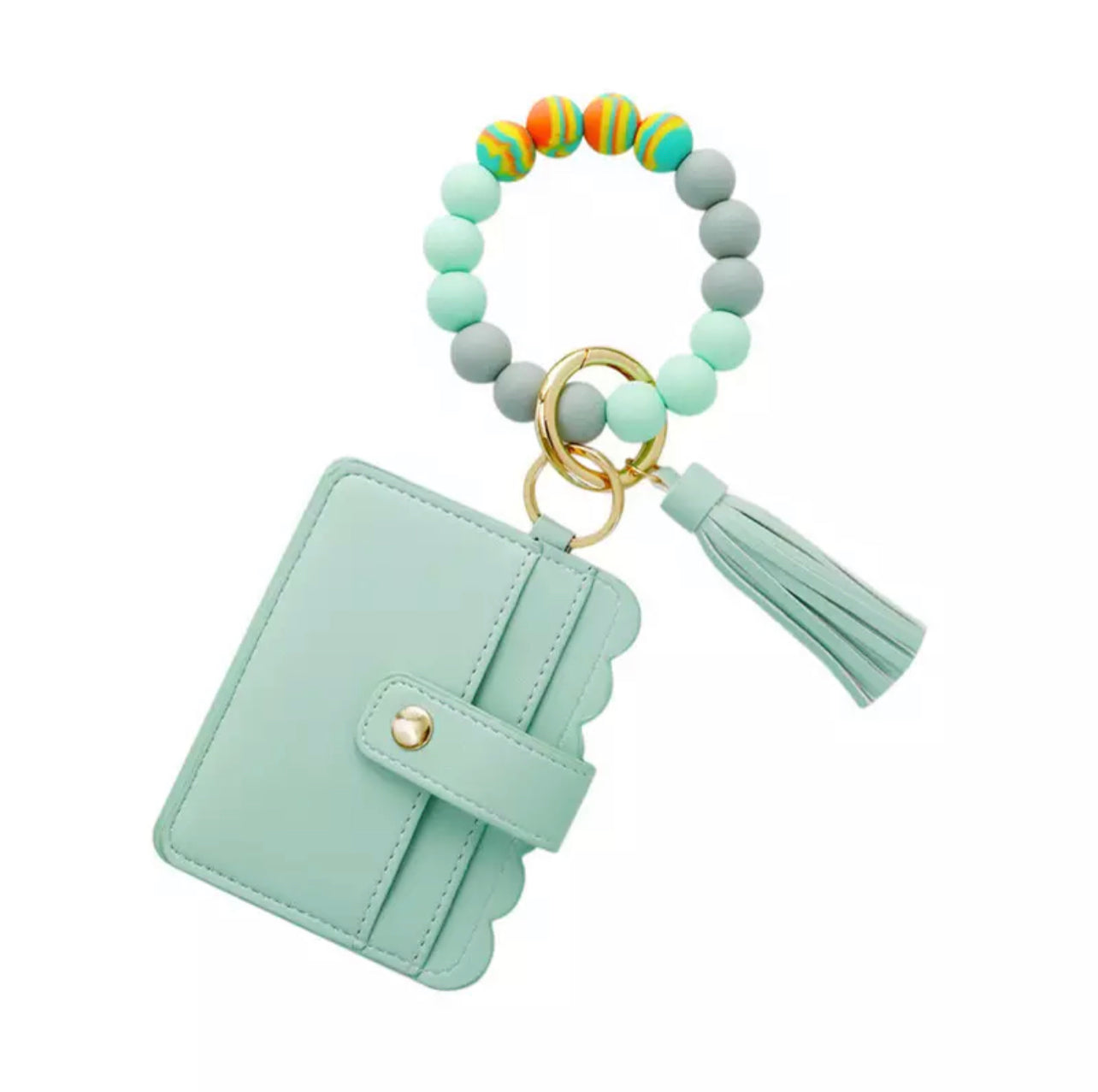 colorful silicone bracelet with mint wallet and tassel attached to it.