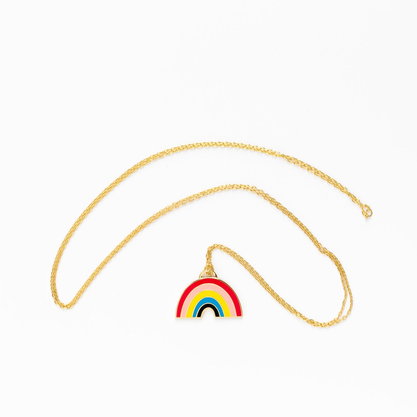 rainbow pendant on gold chain on white background