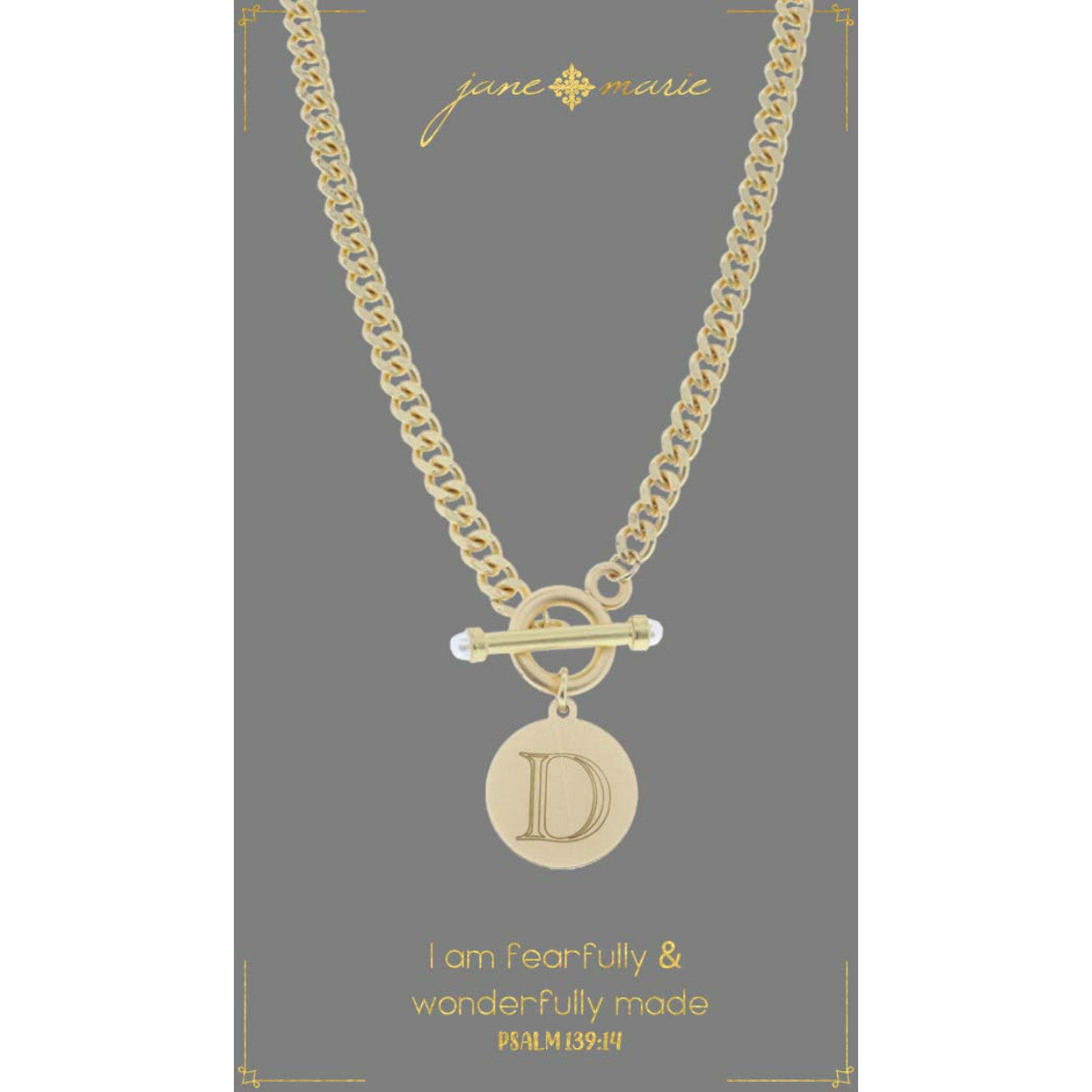 "d" stamped letter necklace on a gray display card on a white background