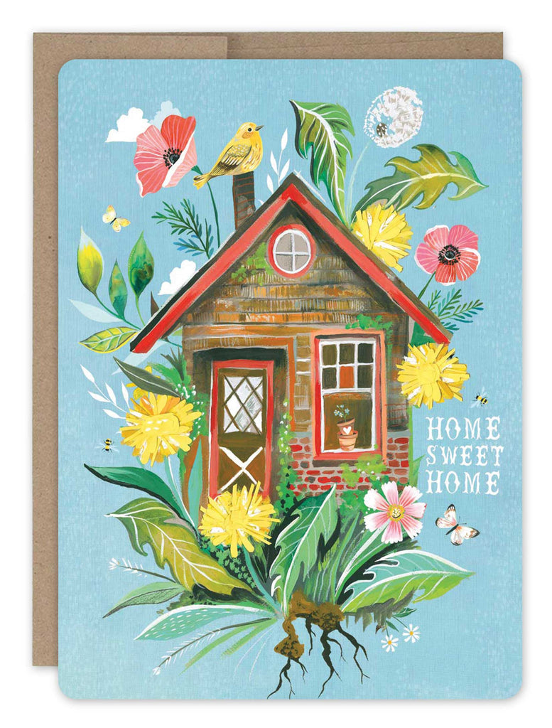 front of card is blue with a brick house in the center surrounded by flowers and a bird with text listed in the description with a natural envelope on a white background