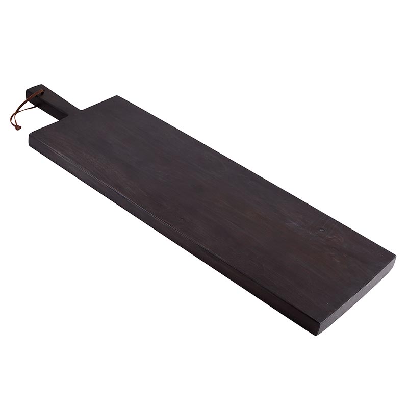 angled view of the black charcuterie board on a white background