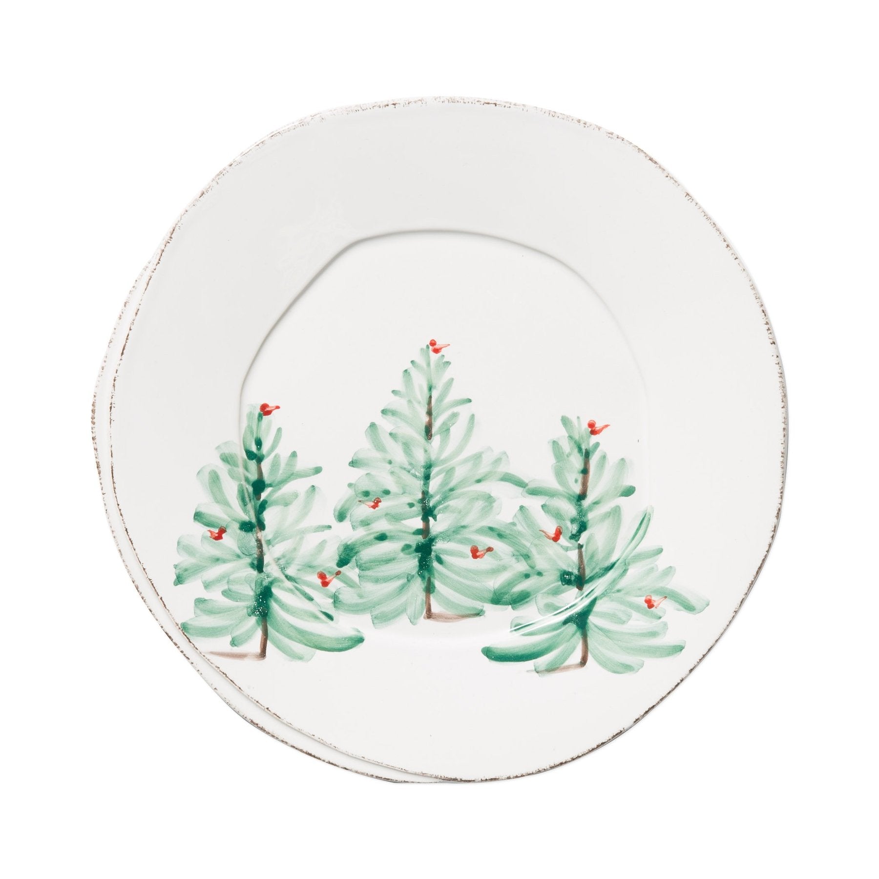 white dinner plate with green holiday trees in the center, on white background.