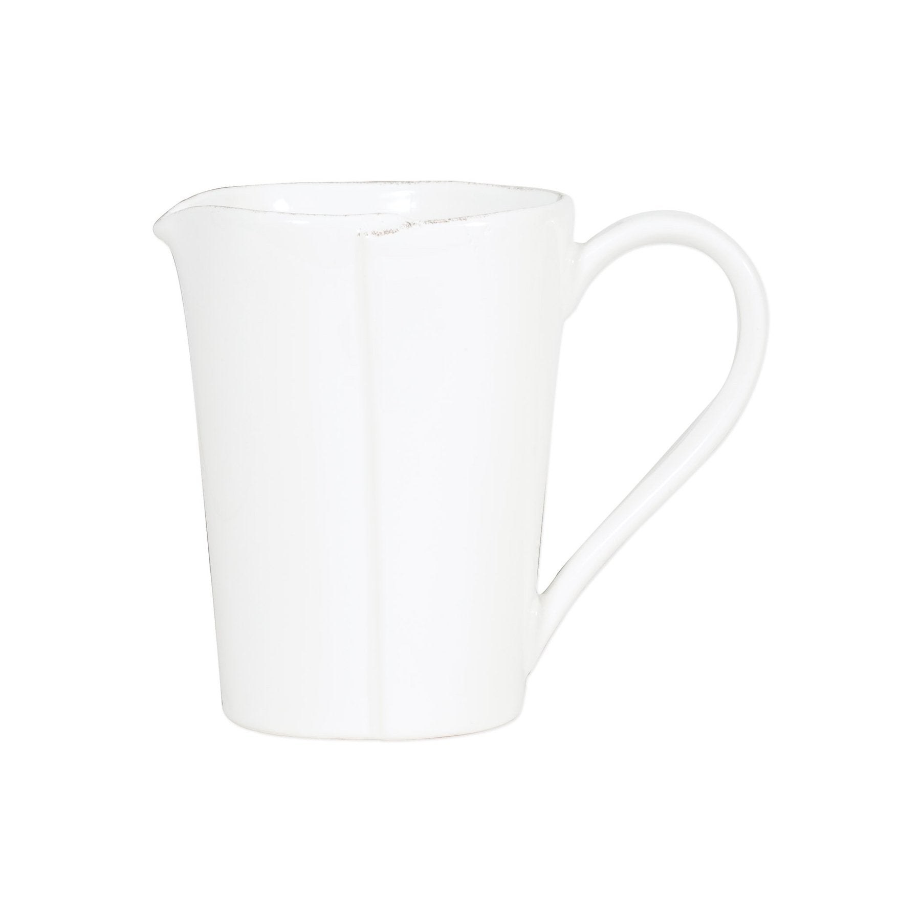 white pitcher on white background.