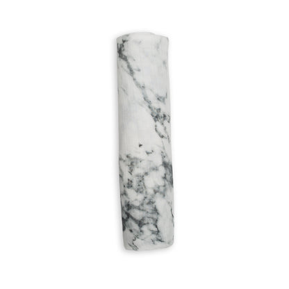 rolled up marble hello world swaddle on a white background
