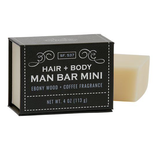 ebony wood and coffee man bar mini displayed next to the box displayed on a white background