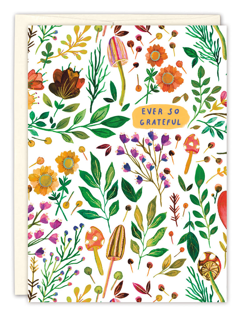 front of card has different vibrantly colored vines and sprigs, mushrooms, flowers and text listed in description with a white envelope on a white background