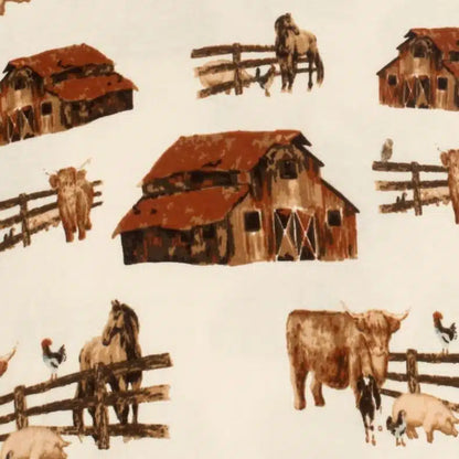 close-up of cream fabric with all-over pattern of barns, horses, and cows.