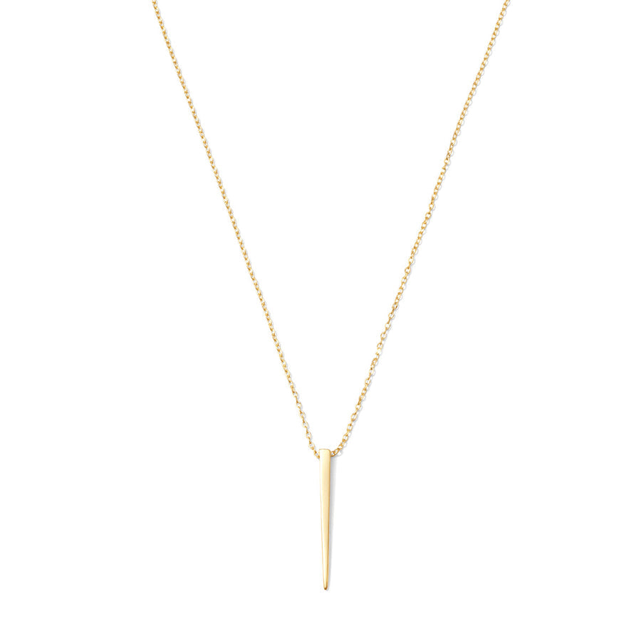 gold chain with long narrow pointed pendant.