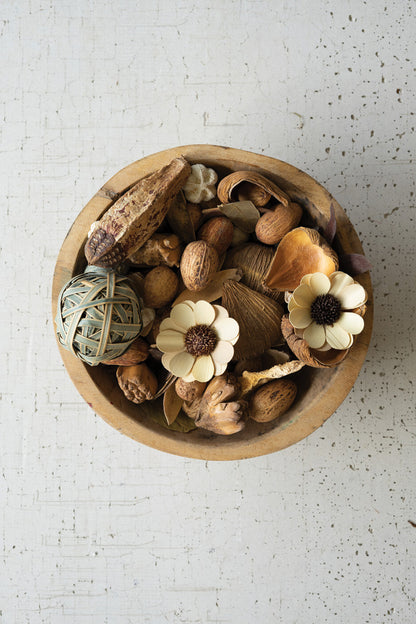 natural decor bowl filler displayed in a wooden bowl on a white speckled background