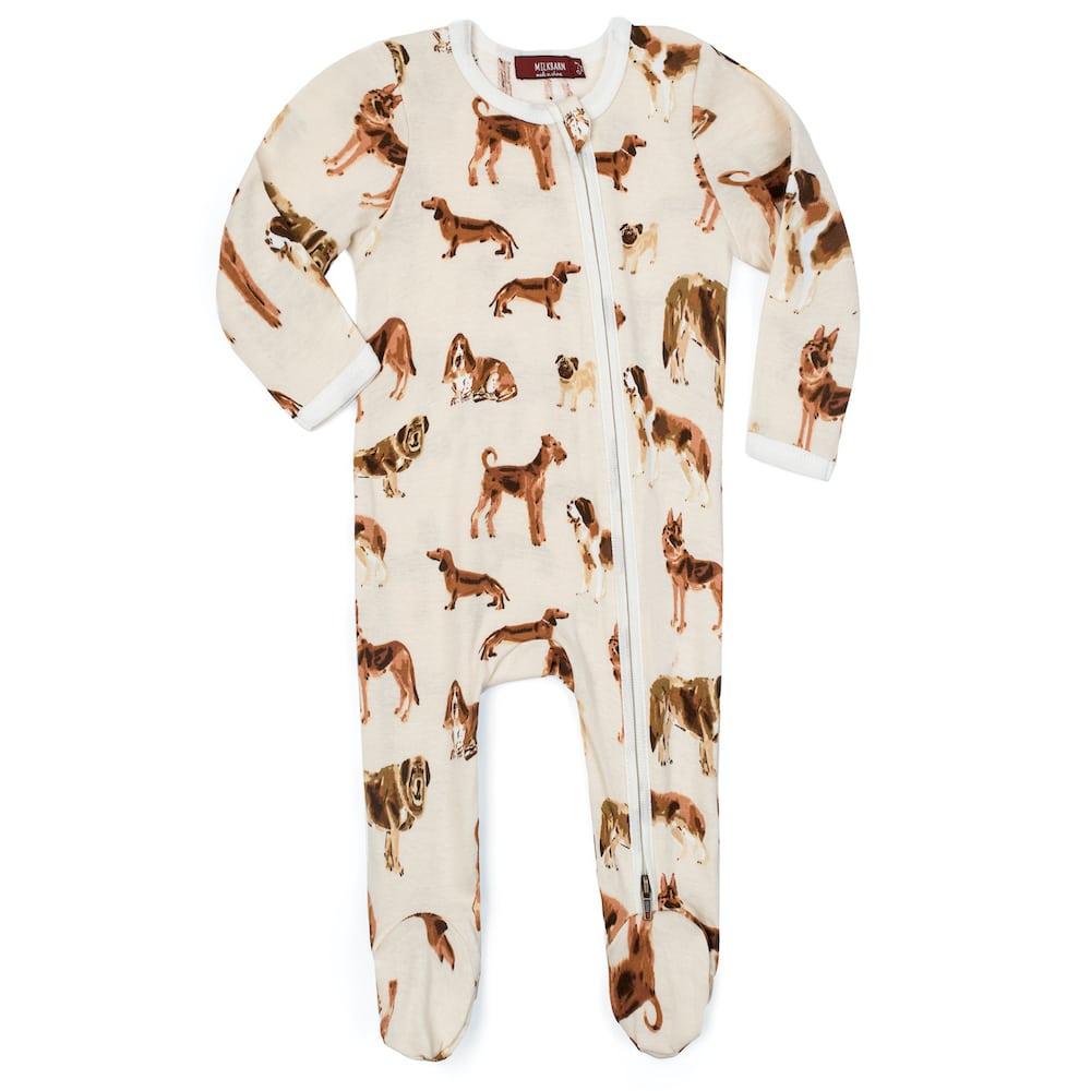 tan footed sleeper with all-over dog pattern.