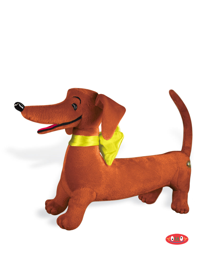 plush brown dachshund with yellow bow on neck on white background