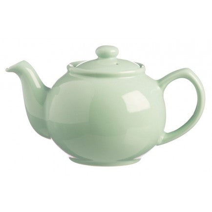 mint teapot on white background.