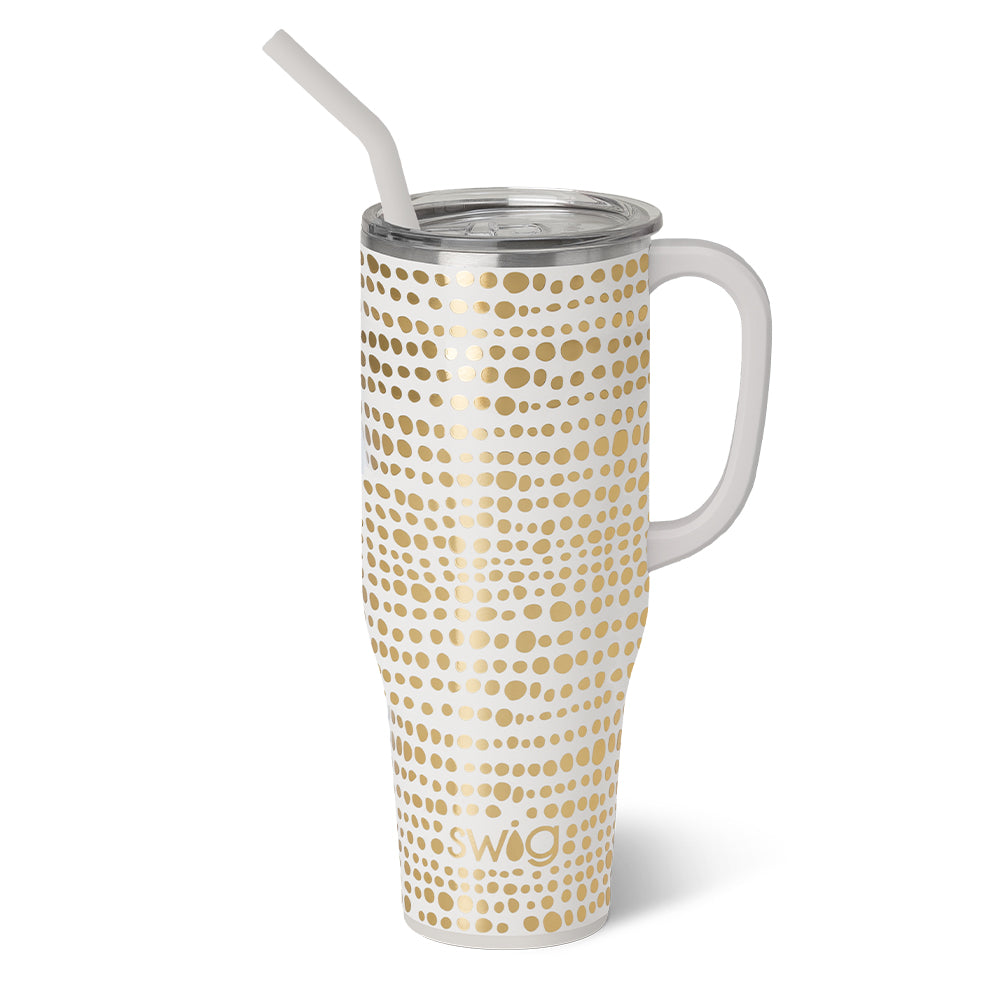 glamazon gold mega mug is white with gold dots all over with lid and white straw displayed on a white background