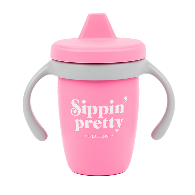 pink and gray sippin pretty happy sippy cup on a white background