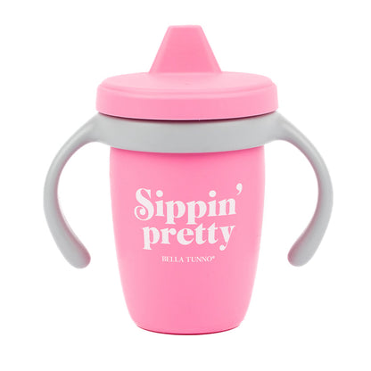 pink and gray sippin pretty happy sippy cup on a white background