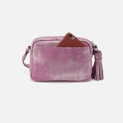 back view of metallic violet renny bag with phone in pocket.