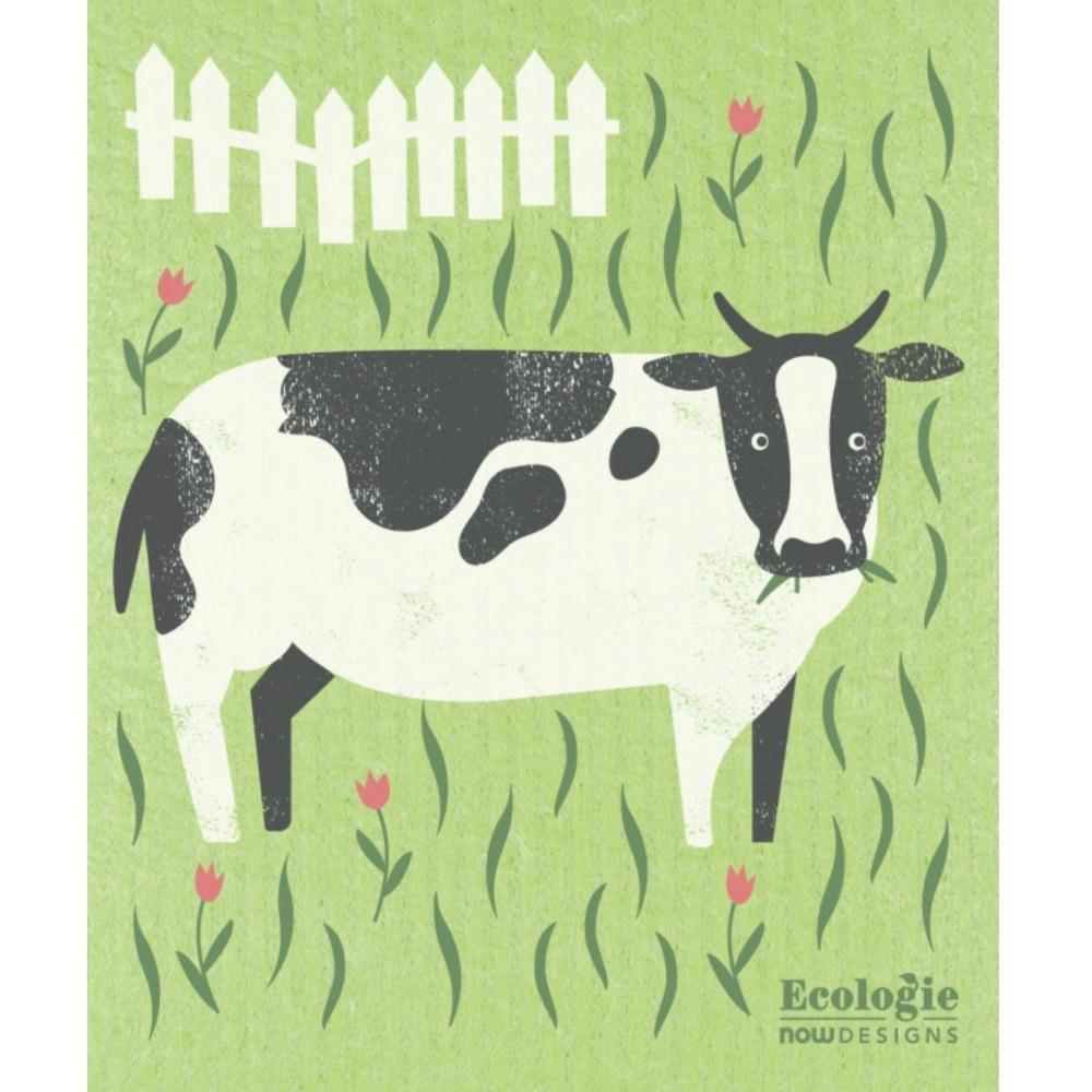 green swedish dish cloth with black and white cow and a picket fence on it.