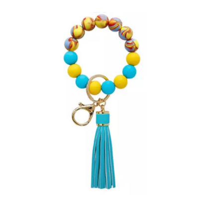 colorful silicone beaded bracelet with blue tassel.