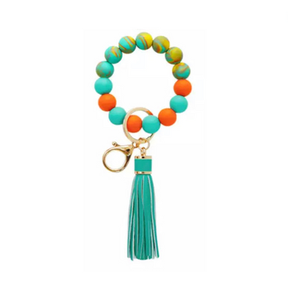 colorful silicone beaded bracelet with turquoise tassel.