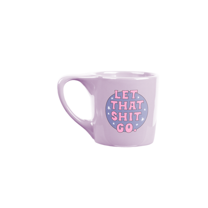 purple "let that shit go" mug on a white background.
