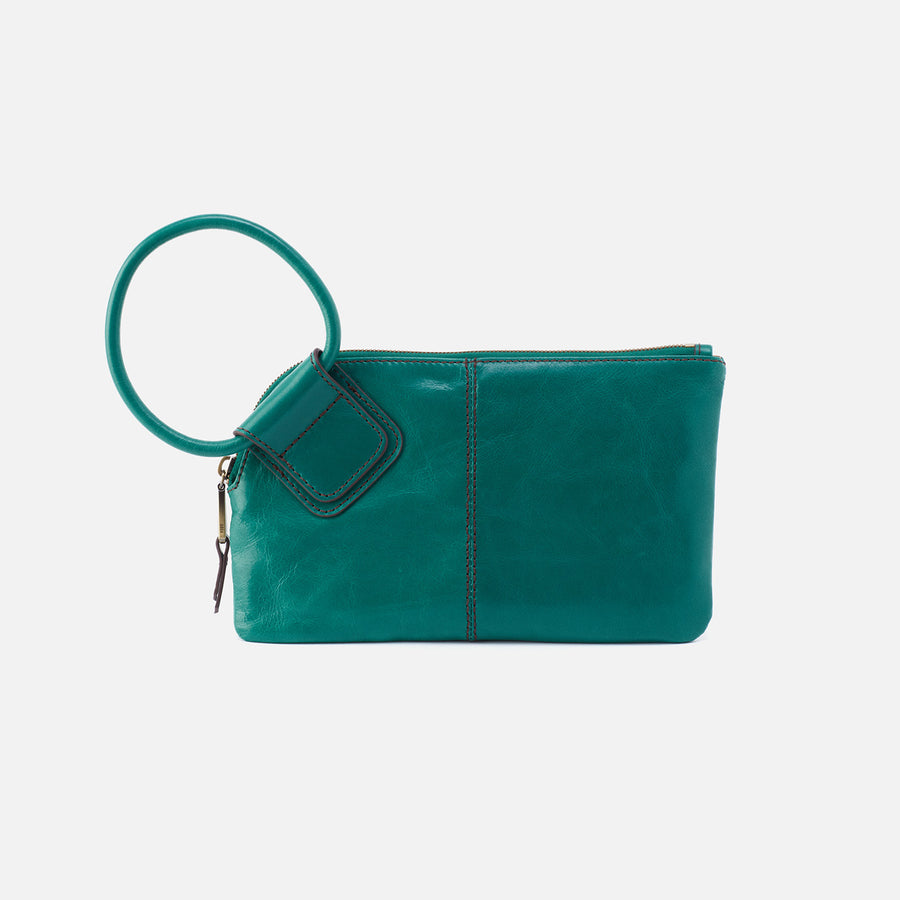 front view of spruce sable wristlet on white background.