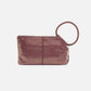 back view of sugar plum sable wristlet on white background.