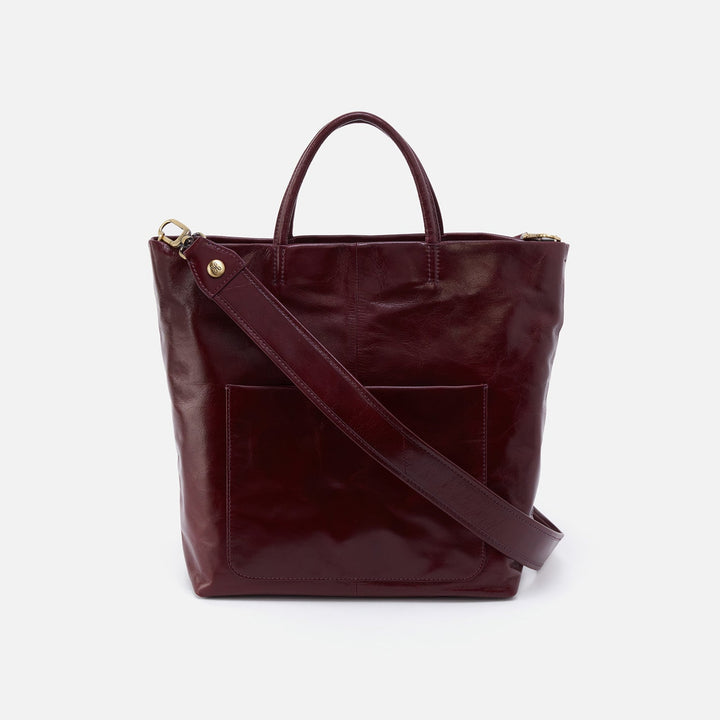 burgandy tote with wide strap.