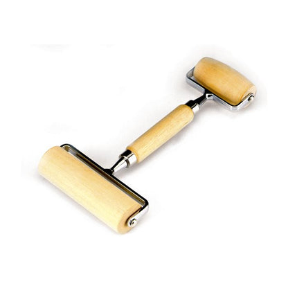 tool with large wodden roller on one end and small wooden roller on other end, wooden handle in the middle.