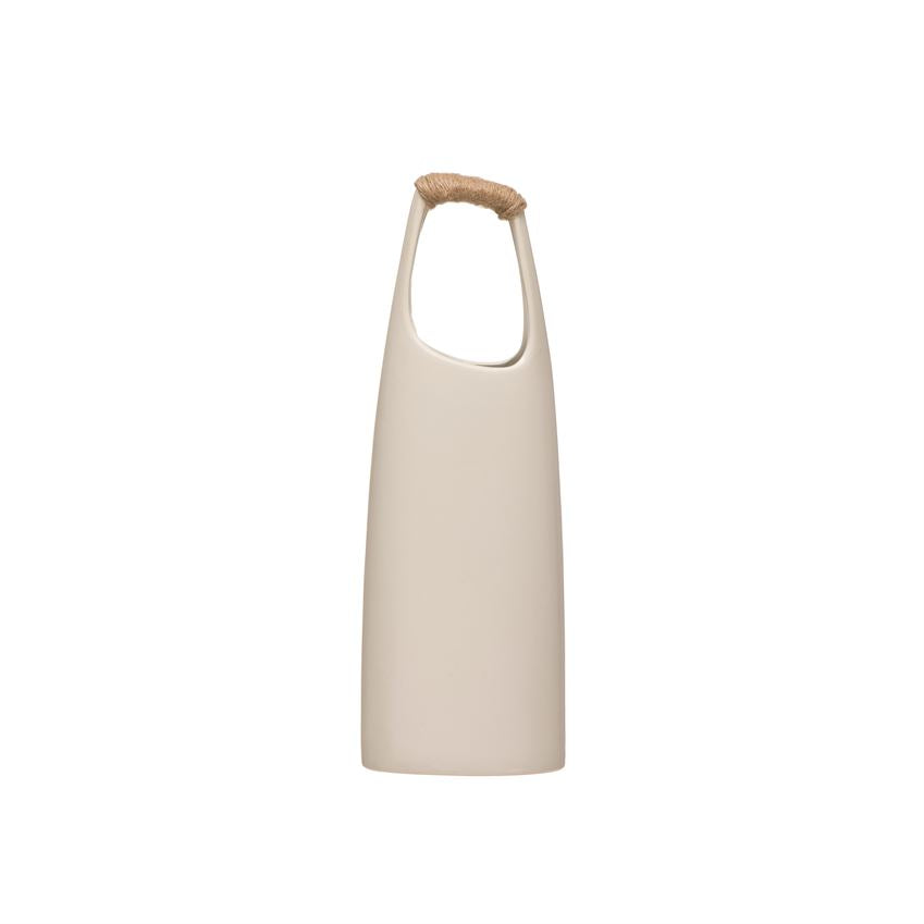 large stoneware vase with rattan wrapped handle on a white background
