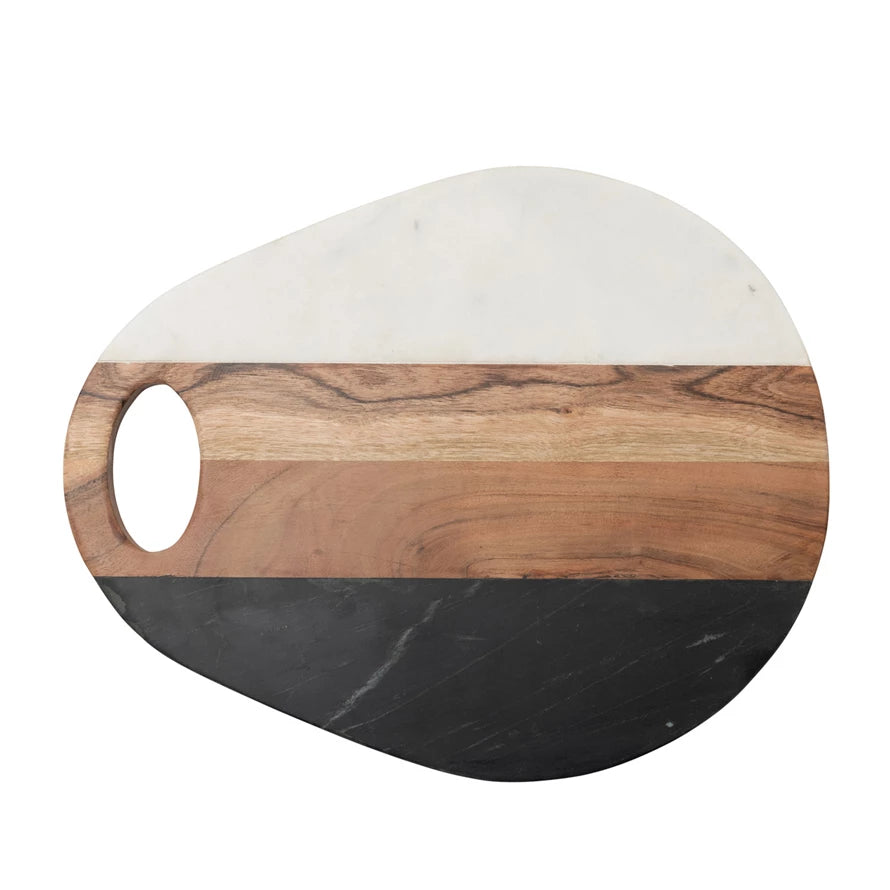 top view of the marble and acacia wood board on a white background