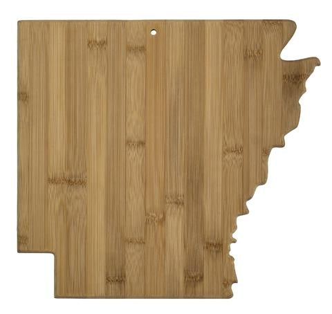 wooden board in shape of Arkansas on white background.