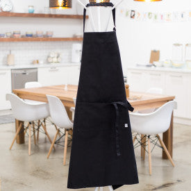 apron hanging on stand in kitchen.