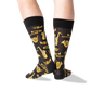 back view of a man wearing the jazz instruments crew socks on a white background