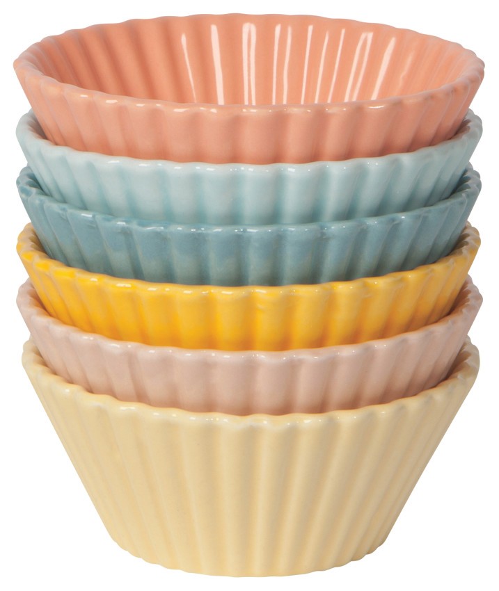 stack of solid color muffin cups: peach, light blue, blue, yellow, pink, and pale yellow.