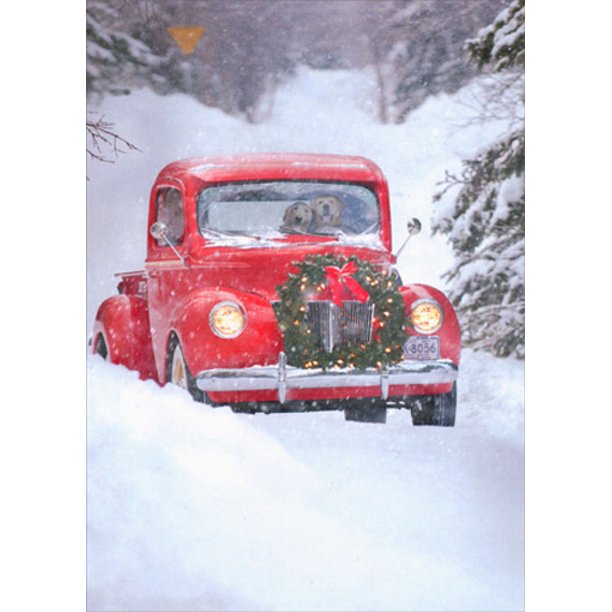 red truck being driven by a dog in the snow on a white background