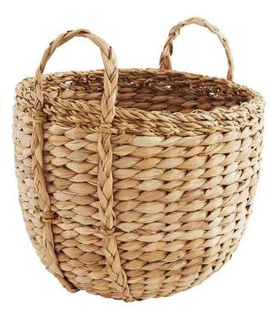 medium seagrass basket with handles on a white background